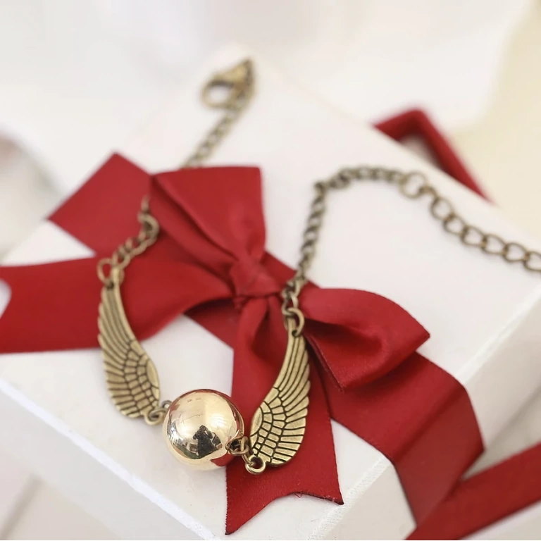 Tematický náramok z Harry Potter série – model so Snitch